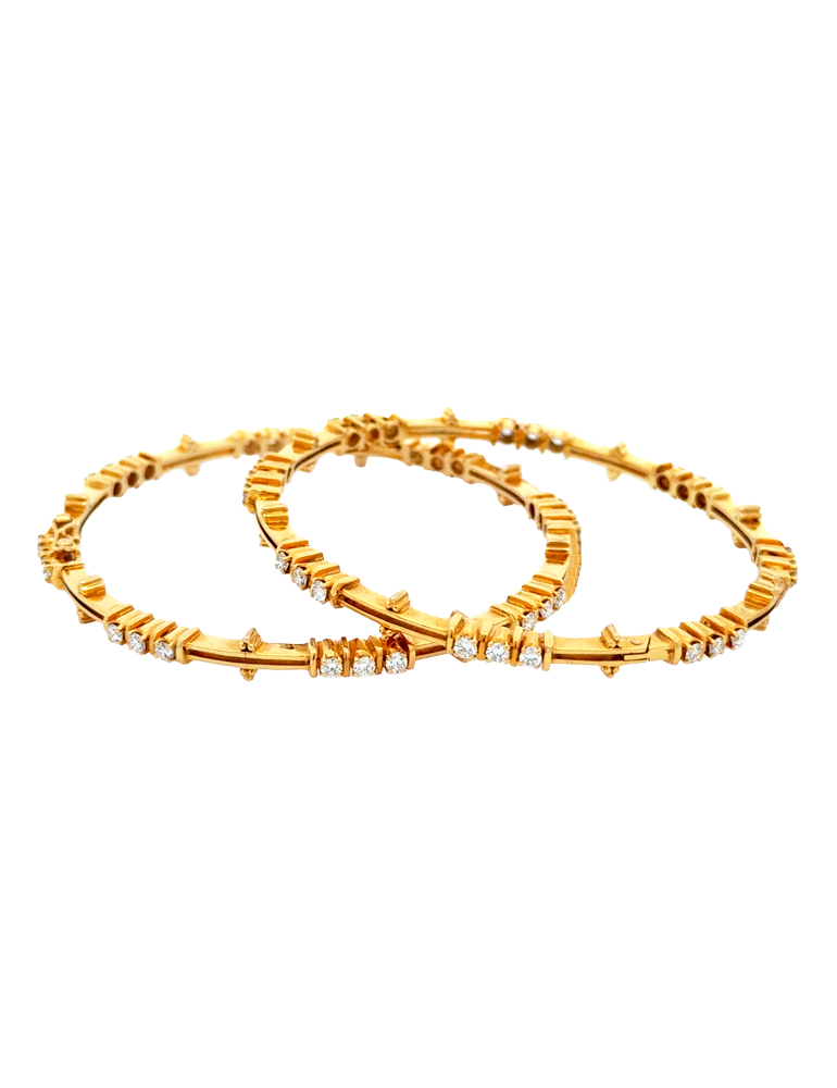 A Pair of Diamond Bangles - 18 Kt